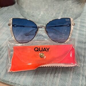 Quay glow up sunglasses. Light blue to pink radiant color.